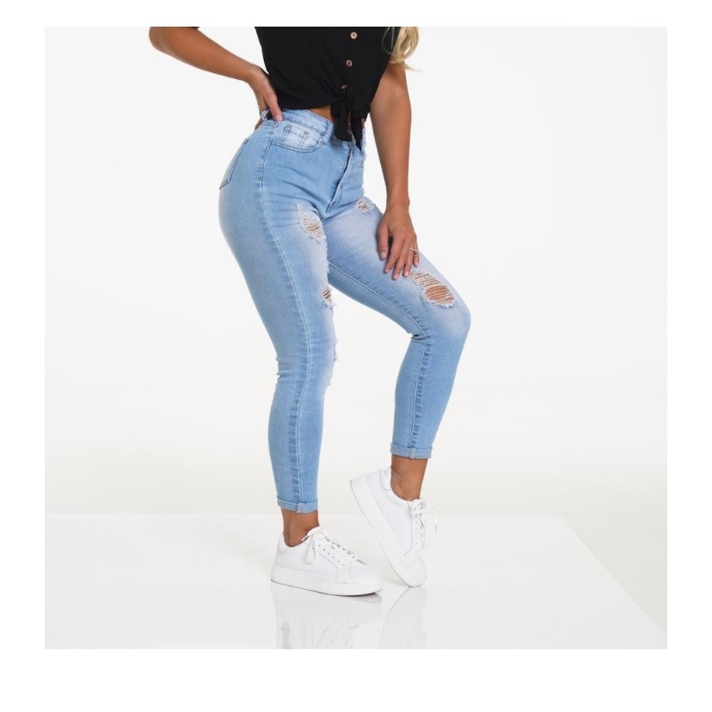 NVGTN light wash ripped jeans size LARGE fits 6-8